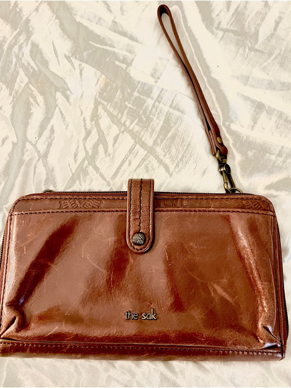 The Sak Chestnut Brown Leather Wristlet Clutch